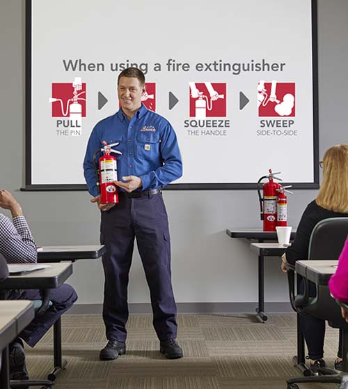 fire technician conducting fire extinguisher training
